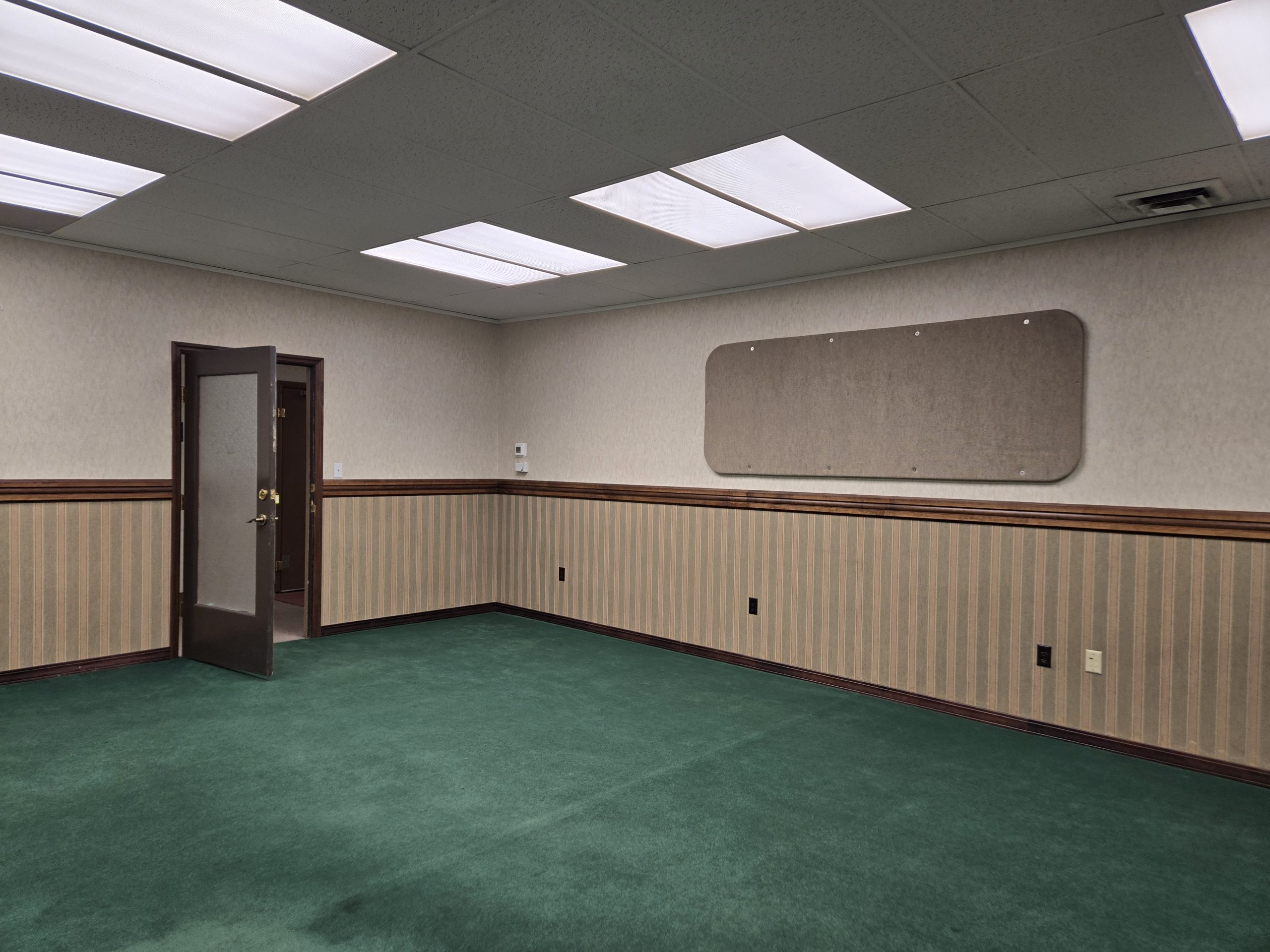 Suite 517 ceiling with skylight panels and open workspace